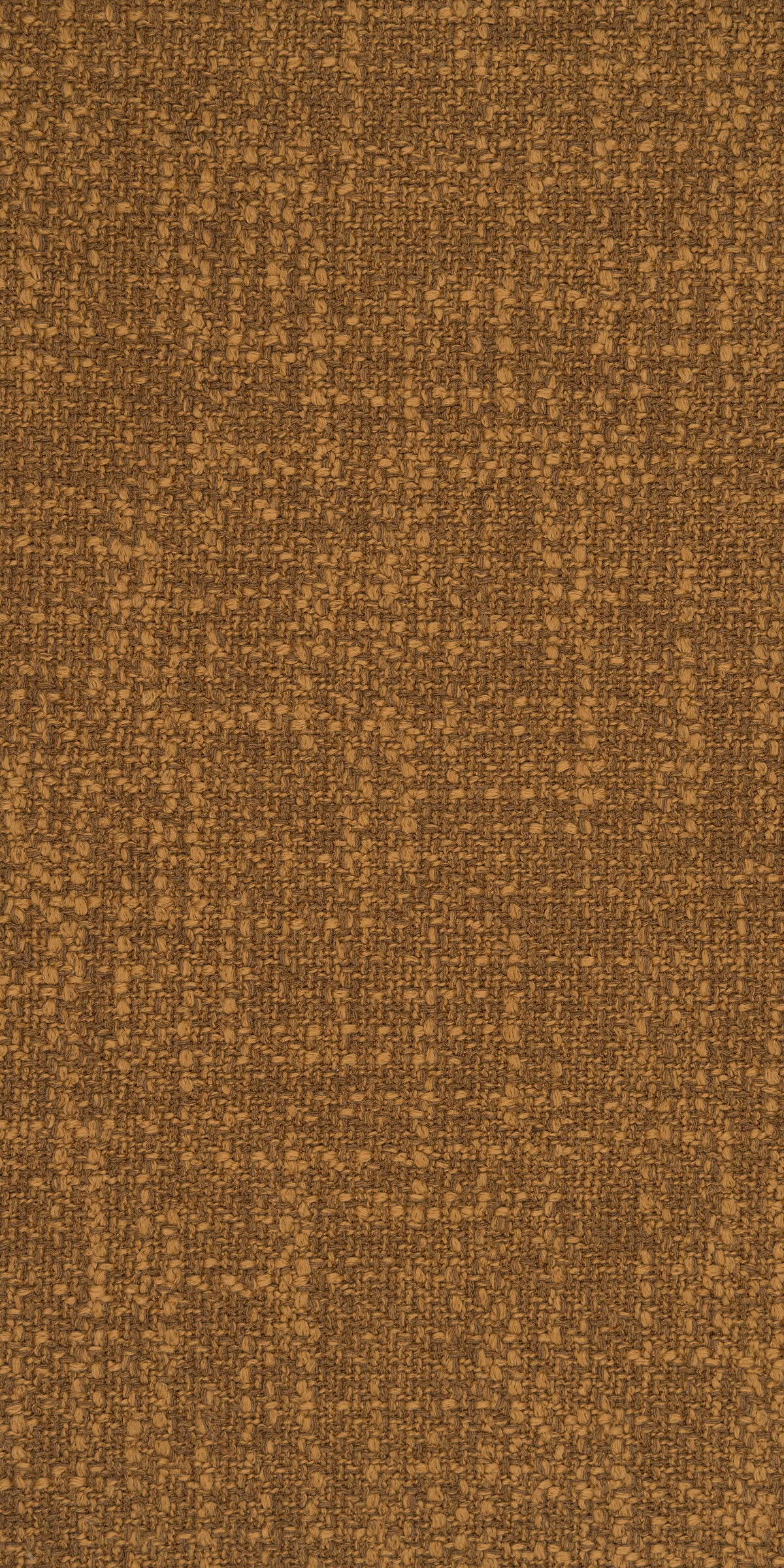 Bruine stof met een gewezen structuur van Leotex, grof geweven in aardetinten als bekledingsstof. Uitstekend voor herstofferen om als meubelstof te gebruiken voor eetkamerstoelen en banken dankzij een licht prikkelend partroon.